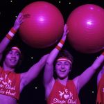 From left, Jameson Fujihara (as Richard Simmons), Samea Aljundi (Jane Fonda) and Jacob Battistoni (Simmons, too) &ldquo;Get Physical&rdquo; during a workout-dance performance on the Kentridge stage Friday night. MARK KLAAS, Kent Reporter
