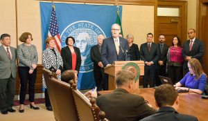 Gov. Jay Inslee with legislators during the media availability on Thursday in Olympia about an executive order signed by Inslee reaffirming Washington&rsquo;s commitment to tolerance, diversity and inclusiveness. Courtesy Photo/Governor&rsquo;s Office