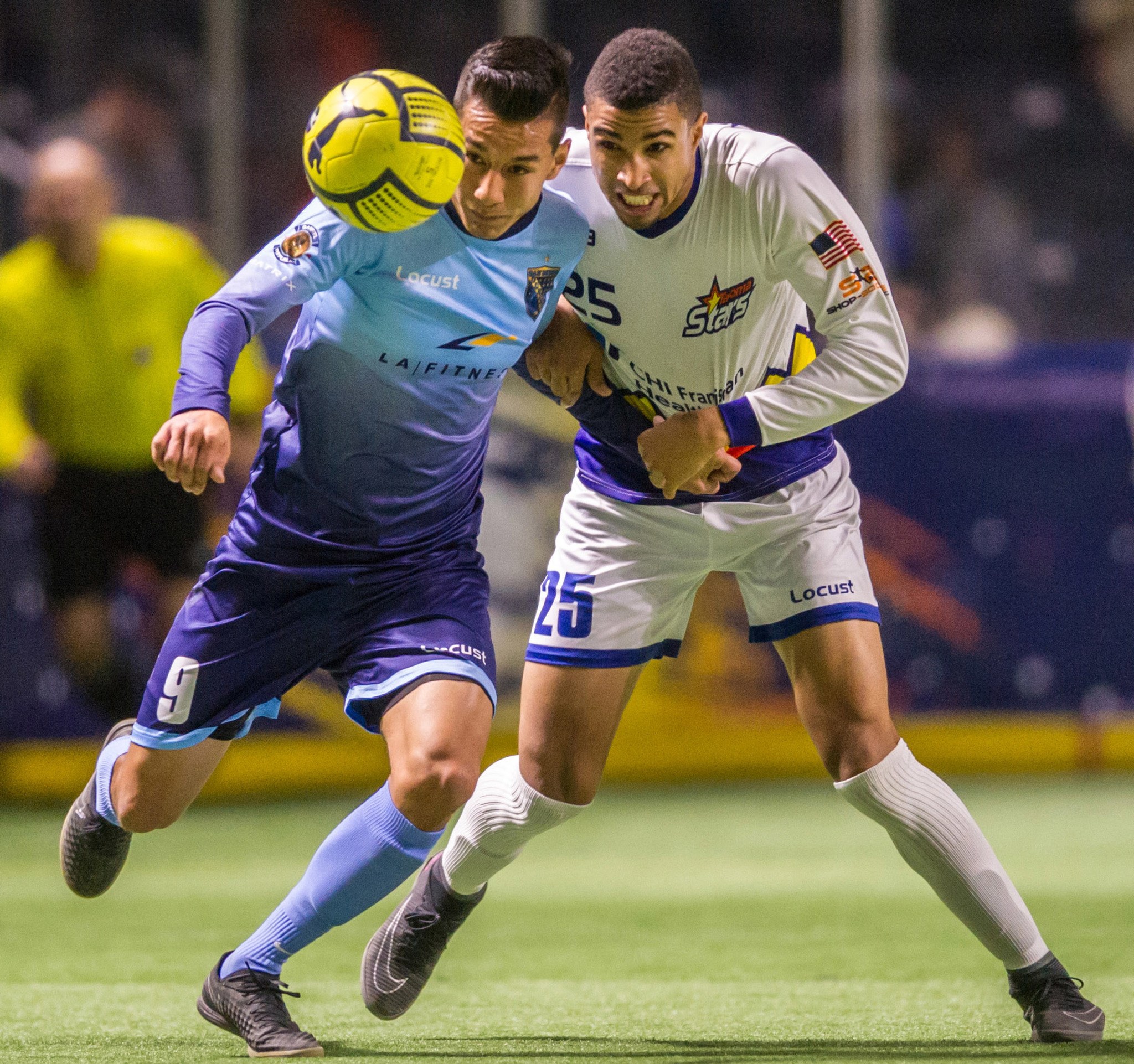 The Stars&rsquo; Michael Ramos, right, battles for the ball. COURTESY PHOTO, Wilson Tsoi/Stars