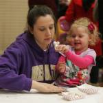Greta Genge and Mandy, 2, create a clay sculpture during the Kent Kids&rsquo; Arts Day. DENNIS BOX, Reporter