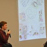 Spencer McLaughlin, a junior at Kentwood High School, presents his group&rsquo;s first sketch, which shows students interacting with people throughout the world using technology such as Skype. McLaughlin, a third-year student in Kentwood&rsquo;s Japanese program, said he would like to have more opportunities to practice his Japanese with native speakers. HEIDI SANDERS, Kent Reporter