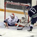 The Thunderbirds&rsquo; Tyler Adams attempts a shot at Blazers goalie Connor Ingram during WHL play Wednesday night. COURTESY PHOTO, Allen Douglas