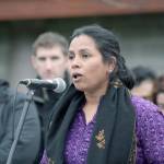 Rita Meher, a Sammamish resident and vigil organizer, speaks at the rally in Bellevue on Sunday. Reporter photo, Ryan Murray