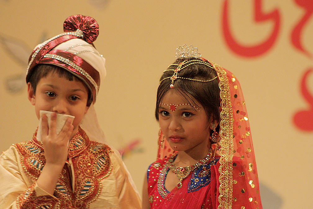 Children flaunt colorful dress during a fashion show. MARK KLAAS, Kent Reporter
