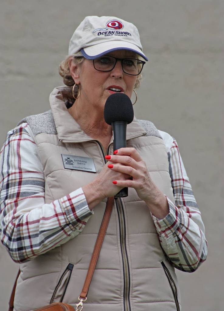 Barbara Smith, KDP executive director, emcees the program. MARK KLAAS, Kent Reporter