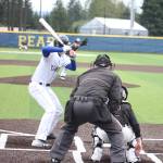 Tahoma freshman Cameron Green looks on as Kentlake junior Jordon Wright releases the ball Wednesday.