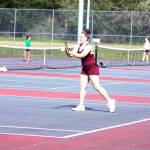 Kentlake Katie Valerio focuses on her return during her match against Chiamaka Okafor from Kentwood.