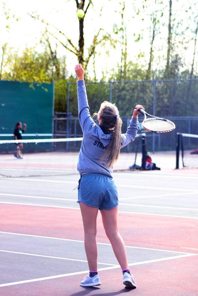 Brianna Stroud serves the ball Wednesday during her match. She lost 6-2, 6-0 to Amy Bender.