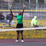Chiamaka Okafor prepares to serve the ball Wednesday. Okafor won 6-1, 6-2 over Katie Valerio.