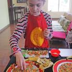 Jaclynn makes breakfast sushi during a Child To Chef cooking class. MARK KLAAS, Kent Reporter