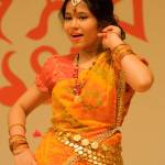 Rijah Taher, 11, performs a dance during a Bengali New Year celebration last Saturday at the Kent Senior Activity Center.