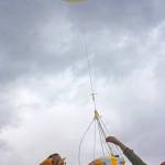 Ryelee Patten, an eighth-grader at the school, joins Eli Sheldon, the school&rsquo;s Computational Thinking program manager, and volunteer Chrissie Grover-Roybal to release the weather balloon earlier Tuesday. MARK KLAAS, Kent Reporter