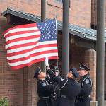 Kent Police Honor Guard flies flag for detective Focht