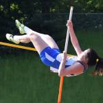 Kent-Meridian&rsquo;s Akoly Vongdala climbed a personal-best 10 feet to finish second in the pole vault. RACHEL CIAMPI, Kent Reporter