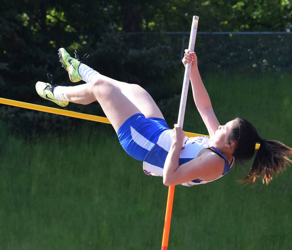 Kent-Meridian&rsquo;s Akoly Vongdala climbed a personal-best 10 feet to finish second in the pole vault. RACHEL CIAMPI, Kent Reporter