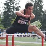 Kentwood&rsquo;s Keetaan DeWitz scoots to victory in the 110-meter hurdles in 15.08 seconds. RACHEL CIAMPI, Kent Reporter