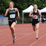 Kentwood&rsquo;s Nicole Soleim dashes to victory in the 3,200 meters in 11:14.63, a personal best. Enumclaw&rsquo;s Hunter Storm finished second. RACHEL CIAMPI, Kent Reporter