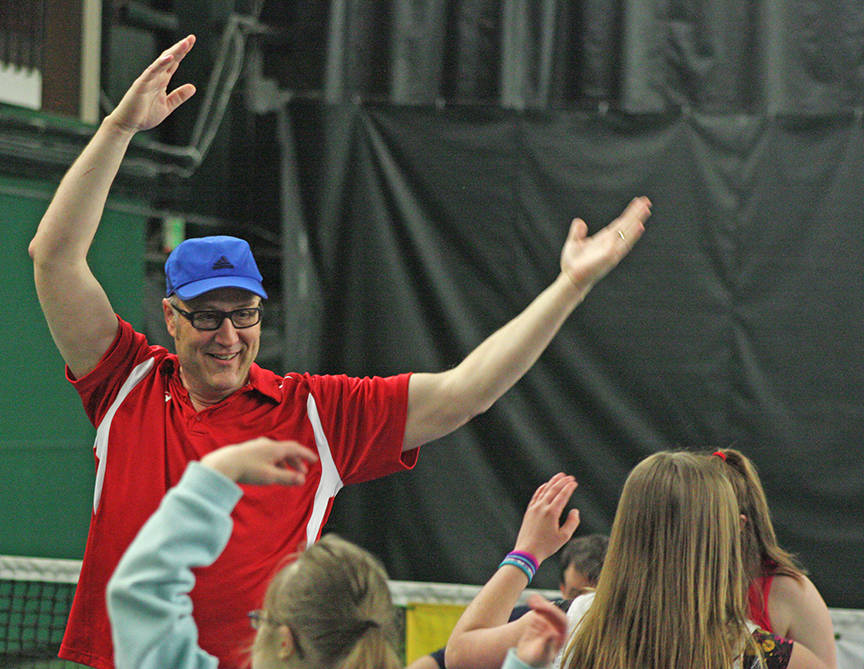 Club member and youth coach Daryl Harper warms up the players with the music of &ldquo;YMCA&rdquo;. MARK KLAAS, Kent Reporter