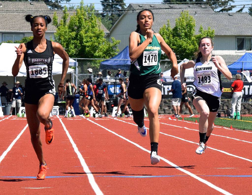 Kentridge&rsquo;s Lauryn Ford, center, runs in the preliminaries of the 100 meters last Friday at the Class 4A state meet at Mount Tahoma High School in Tacoma. Ford finished sixth in the finals on Saturday. RACHEL CIAMPI, Reporter