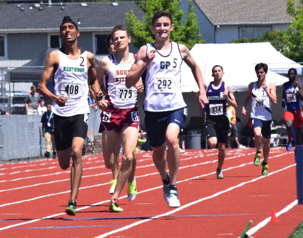 Kentwood&rsquo;s Harsimran Singh, left, finishes seventh in the 800 meters at 1:55.70. RACHEL CIAMPI, Reporter