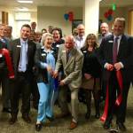 Mayor Suzette Cooke joins First Citizens Bank staff, colleagues and Chamber representatives for a ribbon-cutting ceremony at its new office in Kent on Thursday. COURTESY PHOTO