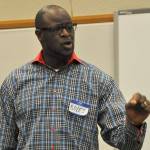 Lawrence Boles III, who pastors Redeemed by the Blood Pentecostal Church in Kent, makes a point at the forum. HEIDI SANDERS, Kent Reporter