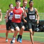 Kentwood&rsquo;s Harsiman Singh, right, races to an eighth-place finish in the 800 meters last Saturday at the West Central District meet at French Field. HEIDI SANDERS, Kent Reporter