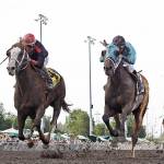 Javier Matias drives Barkley, left, to victory over Mach One Rules, with Isaias Enriquez up, in the $50,000 Governor&rsquo;s Stakes for 3-year-olds and up at Emerald Downs on Sunday. COURTESY PHOTO, Emerald Downs