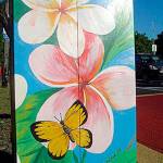 A city of Seattle traffic signal box decorated with art.