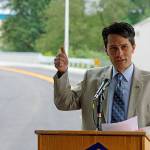 Kent City Coucilman Dennis Higgins helps celebrate the extension on Wednesday of 72nd Avenue South from South 196th Street to South 200th Street. Mark Klaas/Kent Reporter