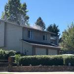A puff of smoke shoots from a home Thursday in the 13000 block of Southeast 279th Place. Courtesy Photo/Puget Sound Fire