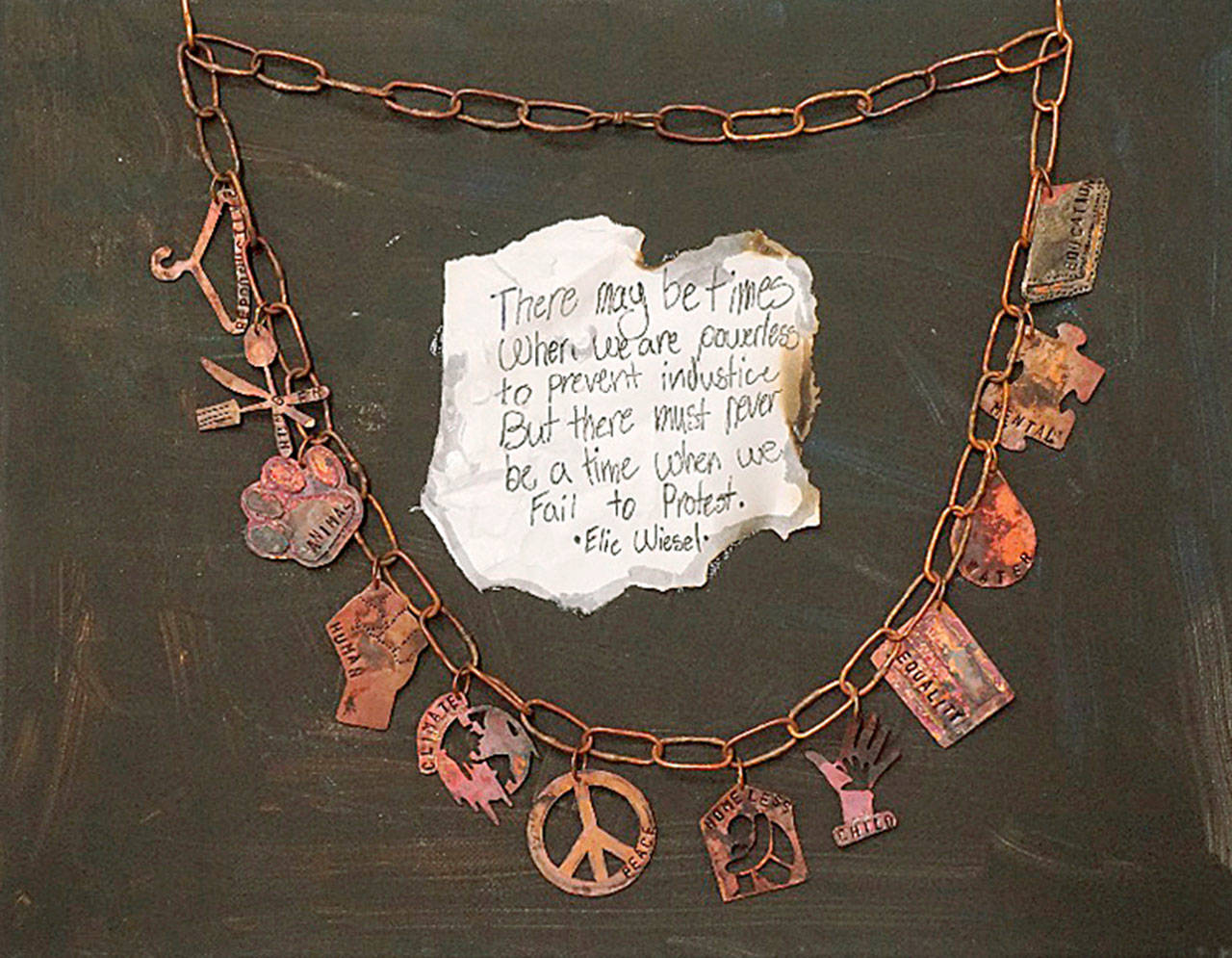 Joey Simanek was awarded second place for his powerful work that uses hand-cut copper images to symbolize different aspects of activism.