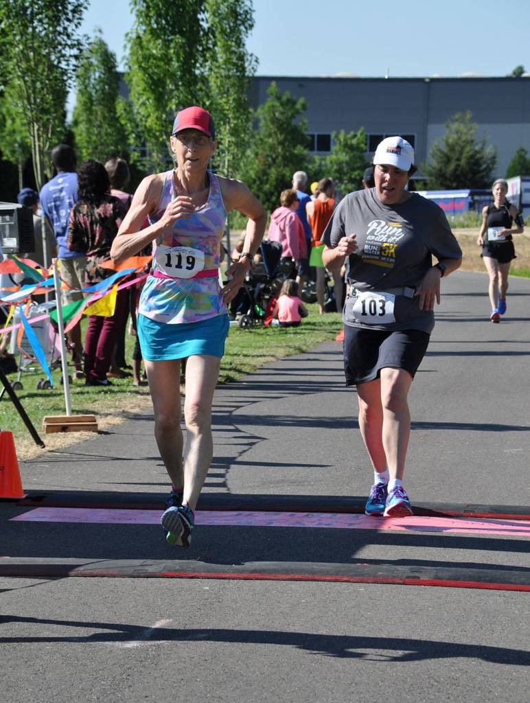Auburn’s Flannery scoots to victory in festival 5K race | PHOTOS