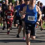 Auburn’s Flannery scoots to victory in festival 5K race | PHOTOS