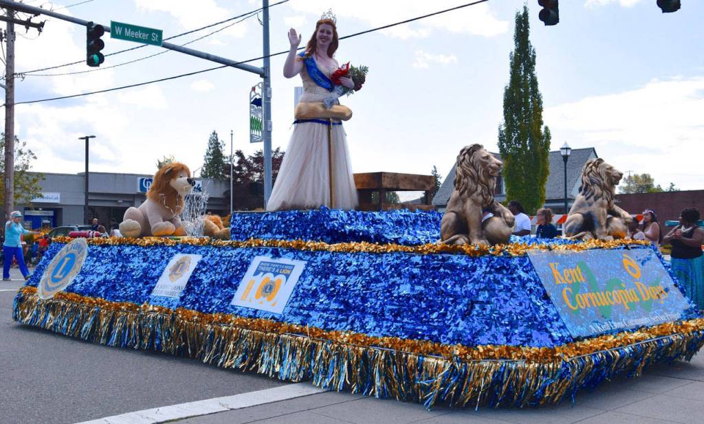 Miss Cornucopia Tara Hoefig waves to the crowd during the grand parade. RACHEL CIAMPI, Reporter