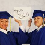 Cadets Marcia Ugalde of Federal Way, left, and Cadet Maria Coronado of Kent hold up a sign that says, &ldquo;Homies for Life&rdquo; before graduation. COURTESY PHOTO