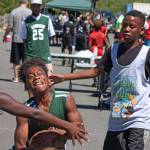 Daniel Jacobs of Auburn&rsquo;s ABA Green drives through the Tuna Squad defense in sixth-grade boys action. MARK KLAAS, Kent Reporter