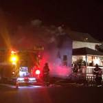 Fire crews battle to extinguish a house fire in the 200 block of East Willis Street on Sunday evening. COURTESY PHOTO, Puget Sound Fire