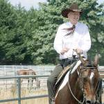 Steve Fahley, of Renton, guides 13-year-old Odie through a turn in the arena. MARK KLAAS, Kent Reporter