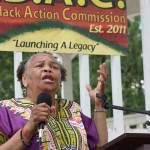 Charmaine Boston, above, KBAC visionary and caterer, talks at the Our Place in the March event at Burlington Green Park in Kent last year. An expanded program returns to the park on Aug. 26. MARK KLAAS, Kent Reporter
