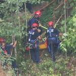Rope rescue teams save woman along Green River