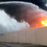 Flames shoot from the Dollar Tree store on Kent&rsquo;s West Hill during a Nov. 13 fire. Courtesy Photo/Puget Sound Fire