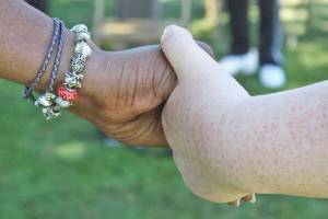 Community pleas for an end to hatred, violence at KBAC program