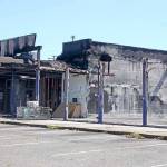 A Dollar Tree store and strip mall on Kent&rsquo;s West Hill along Pacific Highway South remains unchanged since a Nov. 13 fire. Mark Klaas/Kent Reporter