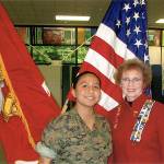 Hilda Meryhew, of the Lakota Chapter, National Defense, right, presents the honor to Cadet Makayla Abeyta at Kentwood High School. COURTESY PHOTO
