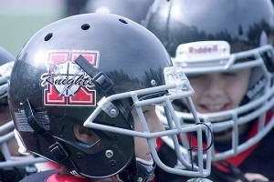 Turf’s up: Knights, Hawks go at it in youth football | PHOTOS