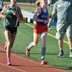 K-M&rsquo;s Allison Baerny beats out Kentwood&rsquo;s Catryce Thompson for a win last week at Kentridge. HEIDI SANDERS, Kent Reporte