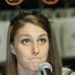 Lydia Christianson, a physical therapist for Outpatient Physical Therapy, ponders a question during an interview with a radio station. MARK KLAAS, Kent Reporter
