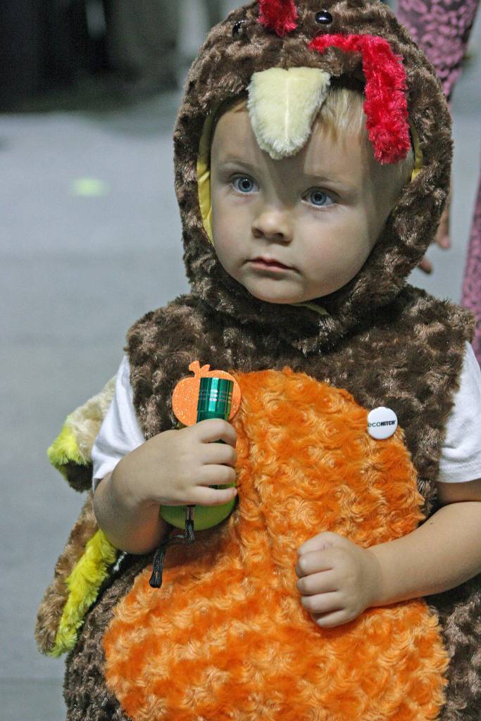Hudson Crawford, 3, the Torklift Turkey, pauses between fun and games. MARK KLAAS, Kent Reporter