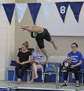 Kentridge&rsquo;s Lauren Briggs, above, explodes at the start of her 100-yard freestyle event during the 4A West Central Districts Girls Swim Dive at the Curtis High School Aquatic Center in University Place last Saturday. COURTESY PHOTO, Tracy Arnold